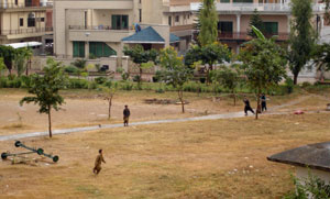 Pathan (Afghan?) boy workers having some fun